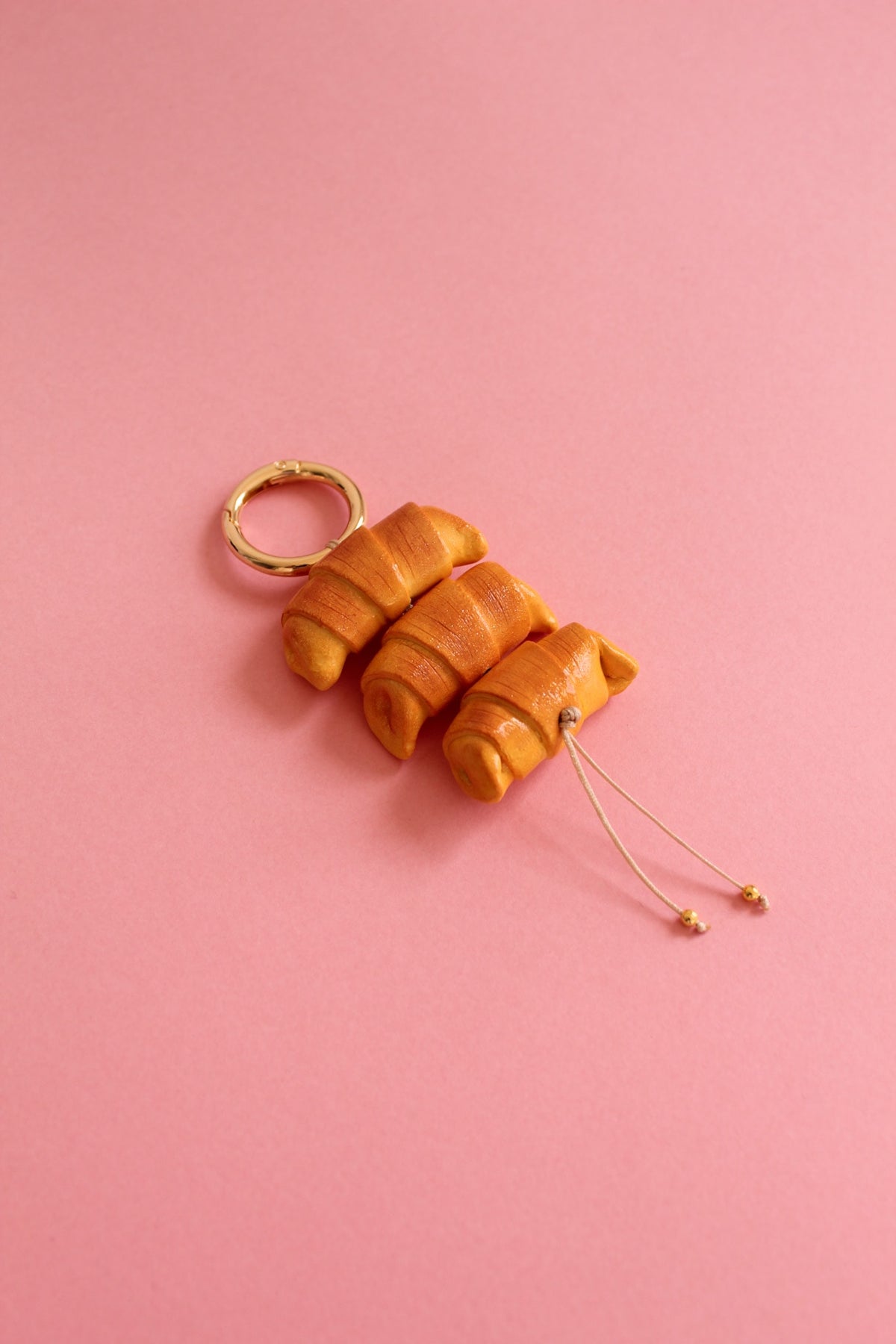 Llavero Croissant – DECATALOGO