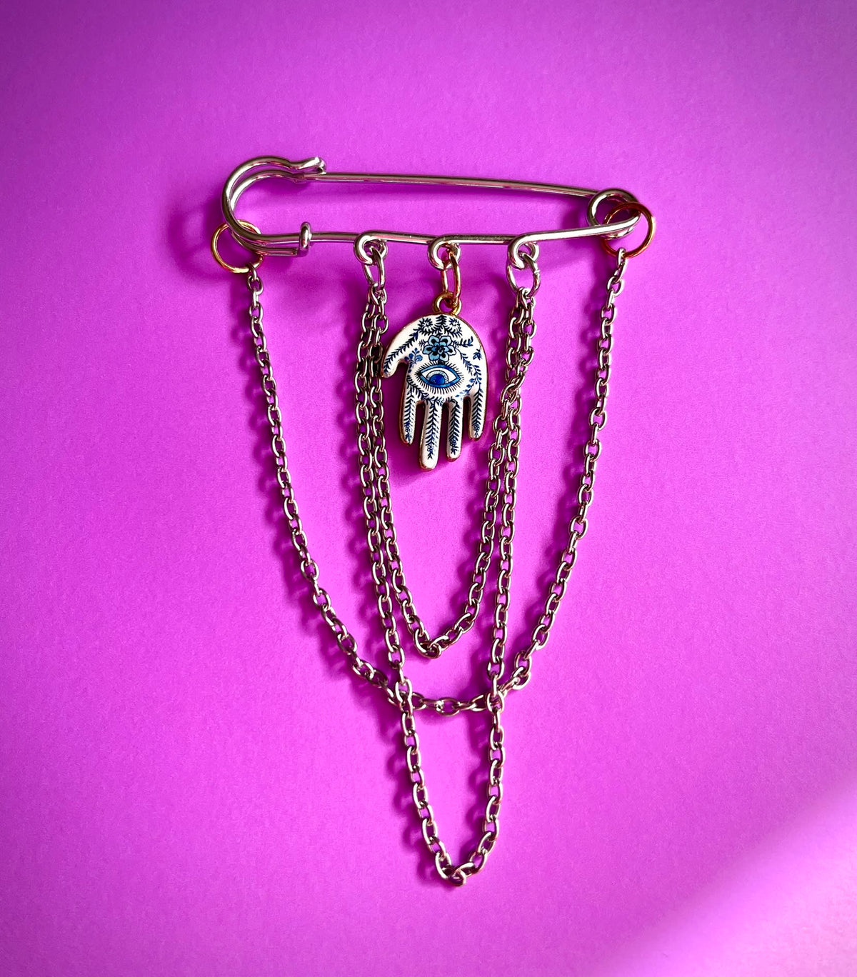 Prendedor hand blue